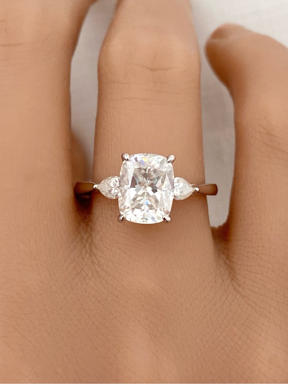 Long Cushion Cut And Pear Moissanite Three Stone Sterling Silver Engagement Ring